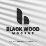 Black Wood on White Wall PSD Logo Mockup