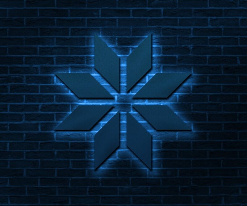 Blue Neon Glow on Brick Wall Logo Mockup