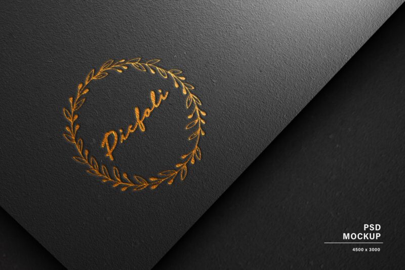 Black Paper with Debossed Gold Logo Mockup